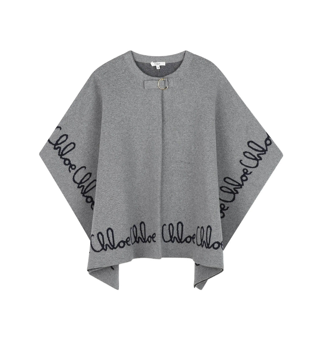 Poncho con ricamo