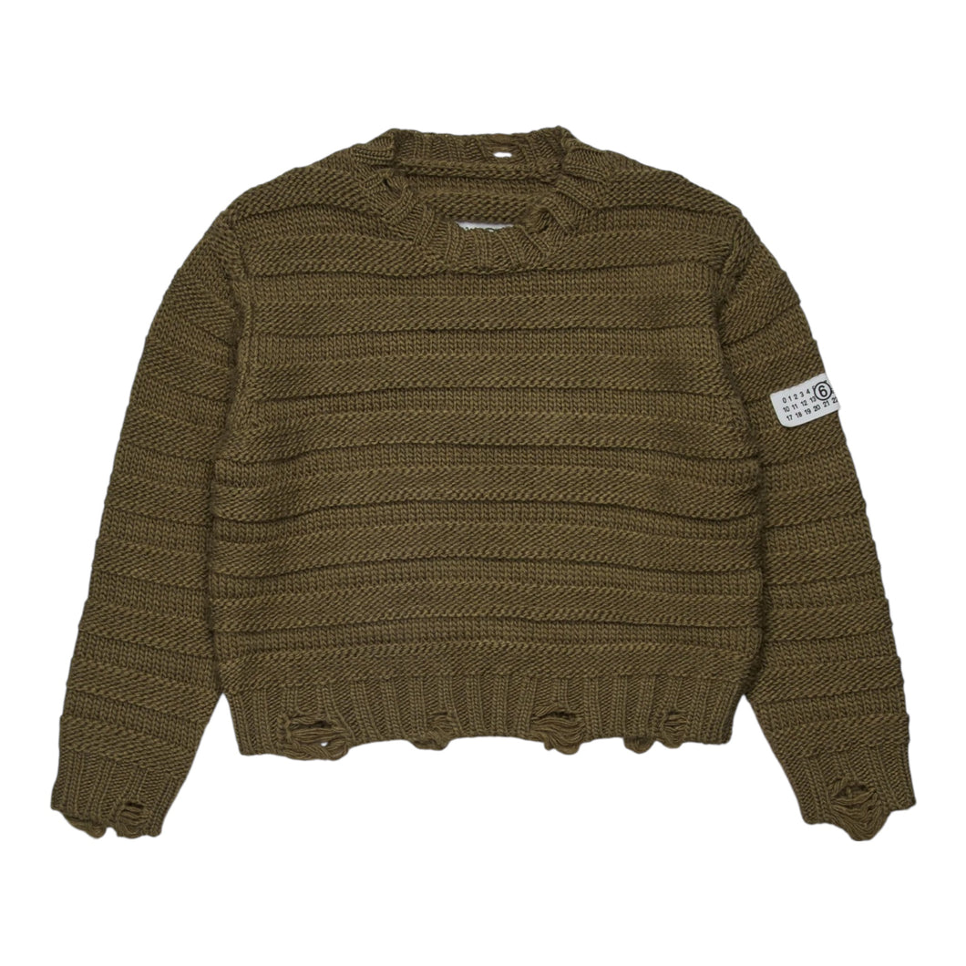 Pullover in misto lana a coste con rotture