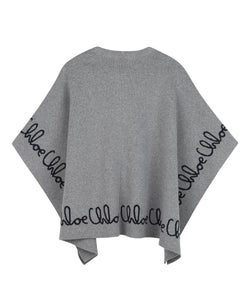 Poncho con ricamo
