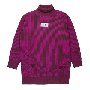 Maxi maglione a coste con rotture